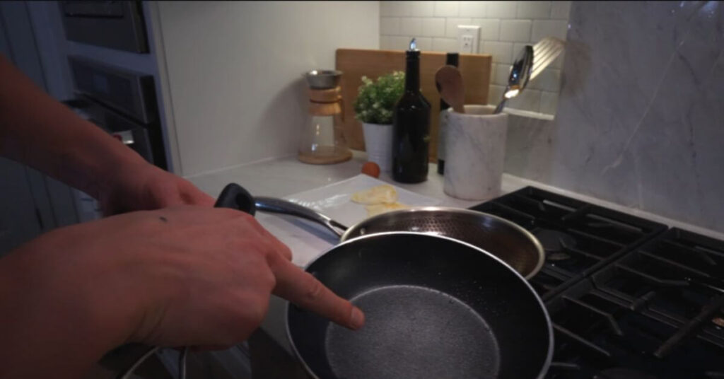 For tougher stuck-on messes, use a mild bleach solution to soak the pan for 10 minutes before rewashing it.